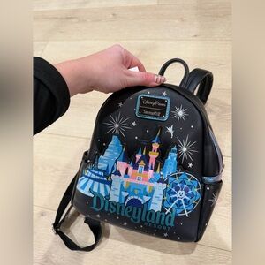 Loungefly Disneyland Resort Black and Blue Backpack
